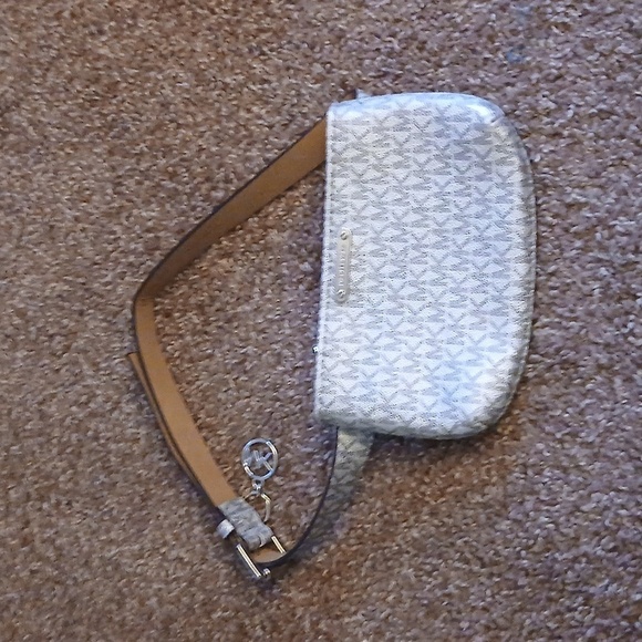 Michael Kors Handbags - Micheal Kors silver monogram belted hip purse size S/M